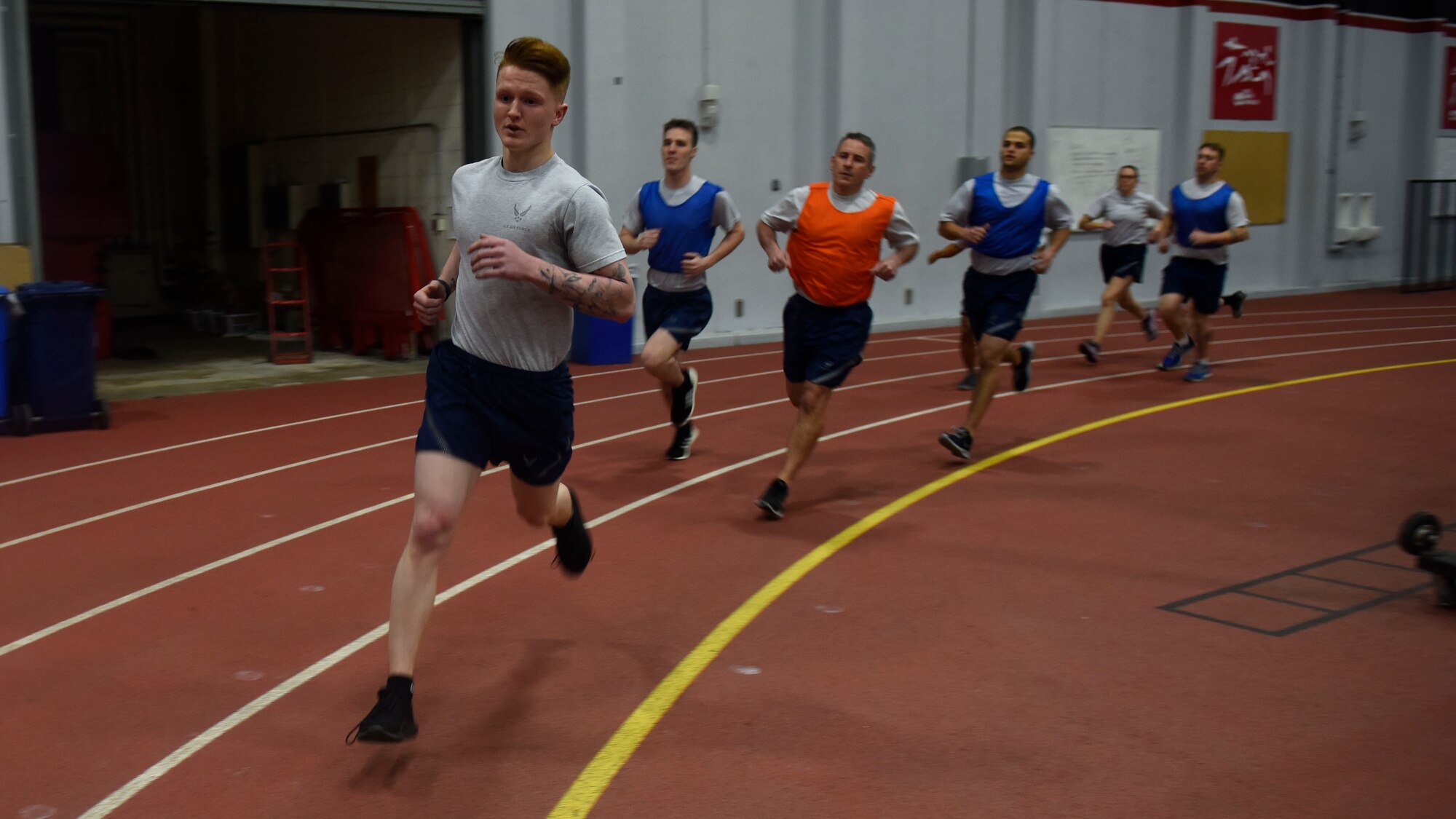 U.S. Air Force Airman 1st Class Tyler Corter, 92nd Medical Operations Squadron medical technician, and fellow Airmen from Fairchild, perform the 1,000-meter run as part of the German Armed Proficiency Badge competition Nov. 17, 2018, at Eastern Washington University in Cheney, Washington. More than 160 service members from 23 different units throughout the Pacific Northwest participated in the event. (U.S. Air Force photo/Airman 1st Class Lawrence Sena)