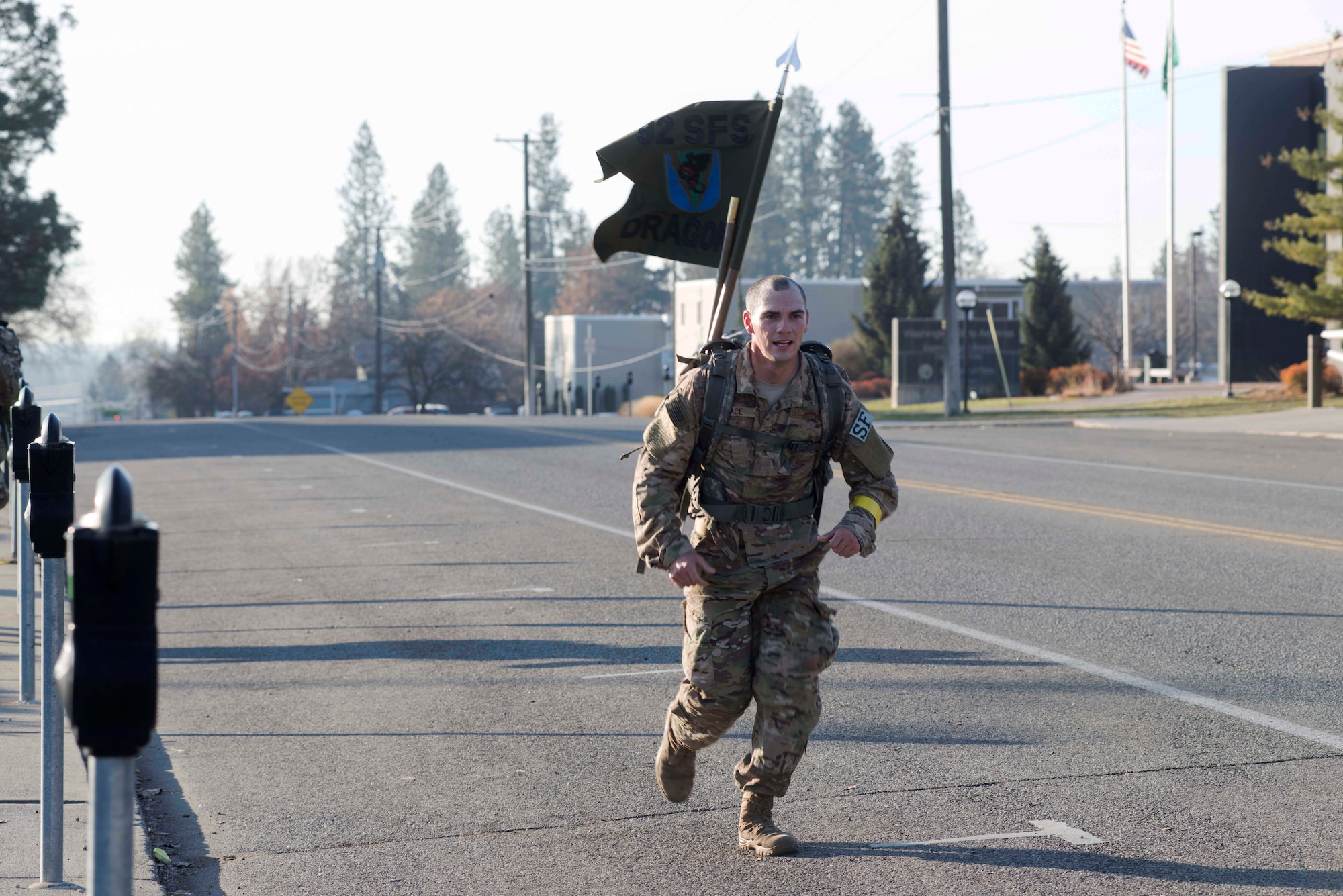 U.S. Air Force Senior Airman Joseph Pace, 92nd Security Forces Squadron installation patrolman, participates in the road ruck-march of the German Armed Proficiency Badge competition Nov. 18, 2018, at Eastern Washington University in Cheney, Washington. Competing for the GAFPB is just one of many opportunities available for Fairchild Airmen to test their proficiency while working alongside foreign allies, National Guard and active duty members from other service branches. (U.S. Air Force photo/Airman 1st Class Lawrence Sena)