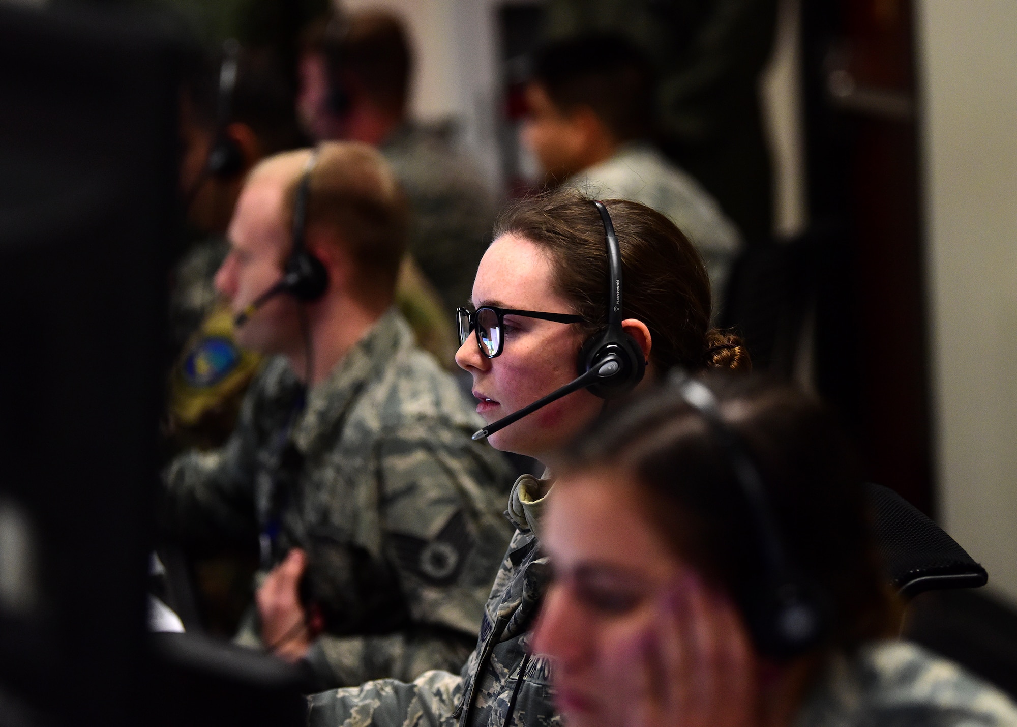 Airmen from the 81st Range Control Squadron provide command and control during a live mission while at Tyndall Air Force Base, Fla., Nov. 19, 2018. The 81st RCS controlled the first live mission out of Tyndall using reconstituted communications towers and systems previously damaged or destroyed by Hurricane Michael. (U.S. Air Force photo by Senior Airman Isaiah J. Soliz)