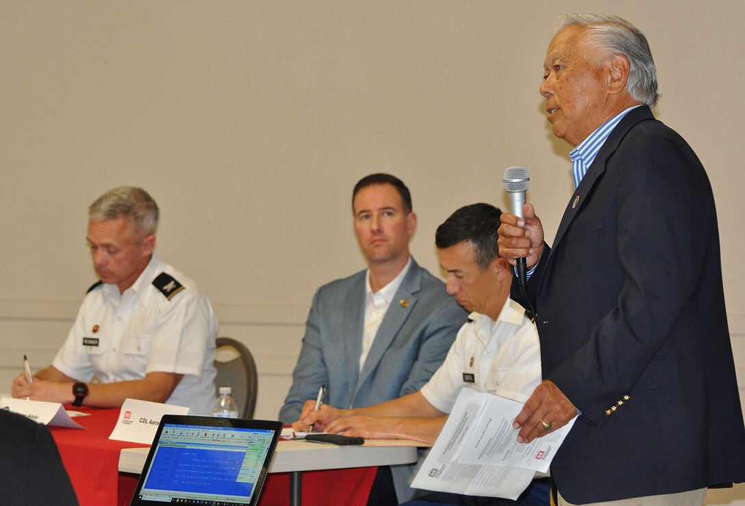 A community member makes a comment about the Bolsa Chica Basin during a Nov. 7 public meeting about the Westminster/East Garden Grove Flood Risk Management Study in Westminster, California.