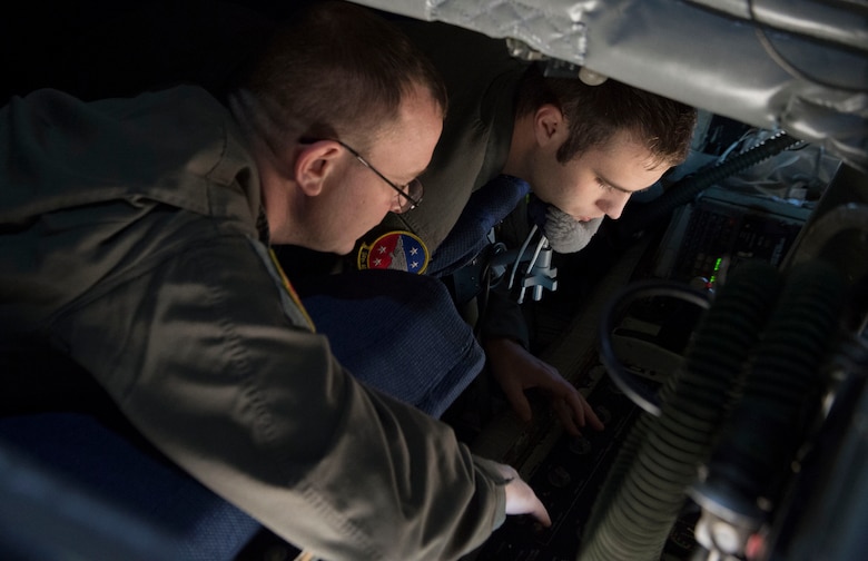 Master Sgt. Christopher Joyce, a boom operator assigned to the 56th Air Refueling Squadron, examines a new boom pod bed Nov. 20, 2018, Altus Air Force Base, Okla. The new boom pod was the winning idea on the Air Force Spark Tank and will be added into every KC-135 Stratotanker.