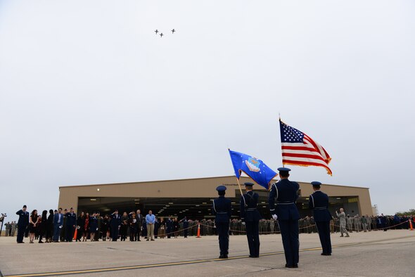 The 87th Flying Training Squadron honors Capt. John Graziano, 87th FTS instructor pilot through a T-38C Talon missing-man formation flyover while the base honor guard presented colors, ending his memorial service on Nov. 21, 2018, at Laughlin Air Force Base, Texas. Members of the base, community, and U.S. Congressman Will Hurd gathered to pay their respects to an aviator who lost his life doing what he loved. (U.S. Air Force photo by Senior Airman Benjamin Valmoja)