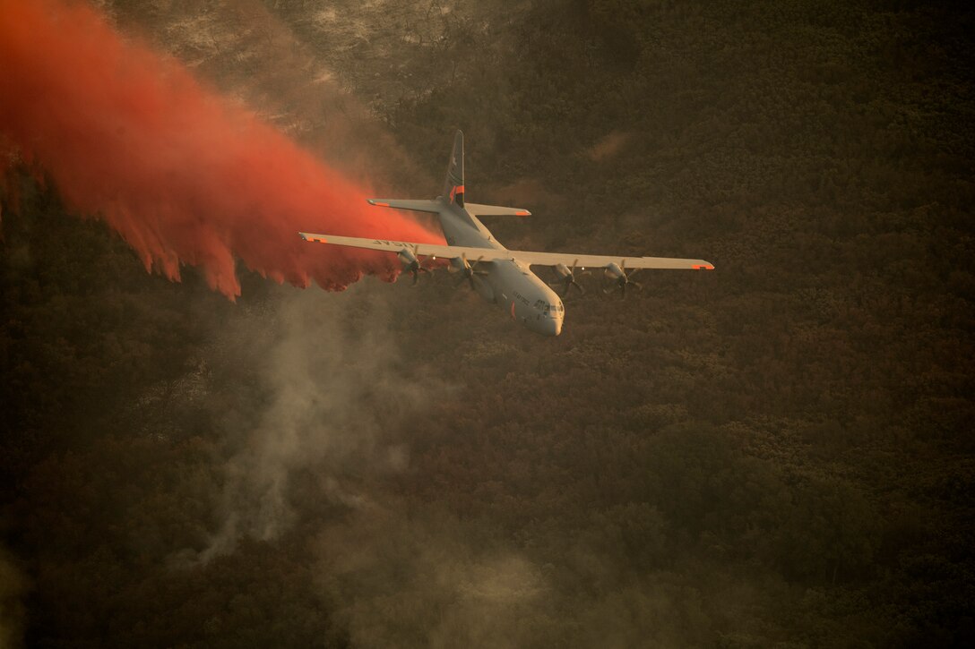 A National Guard C-130J Super Hercules equipped with the Modular Airborne Fire Fighting System