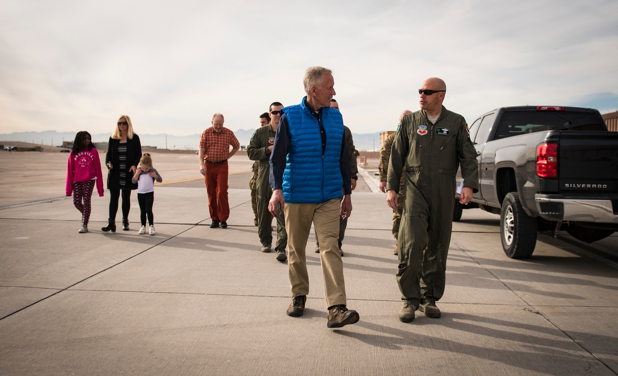 The Cottam family speaks with 66th Rescue Squadron Airmen during a squadron tour at Nellis Air Force Base, Nevada, Nov. 16, 2018. The 66th RQS rescued Dr. Daniel Cottam, his wife and his uncle when Cottam was severely injured after falling during a hike near Zion Canyon, Utah. (U.S. Air Force photo by Airman 1st Class Andrew D. Sarver)