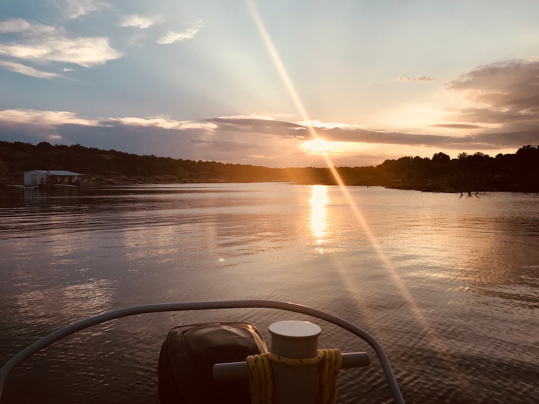 CONCHAS LAKE, N.M. – The sun sets on the lake at Boot Canyon, July 4, 2018. Photo by Nadine Carter. This was a 2018 photo drive entry.