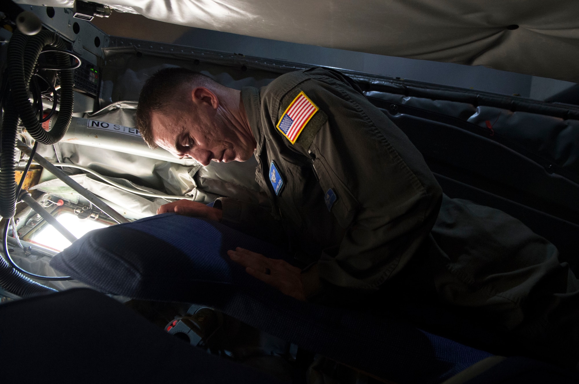 Master Sgt. Christopher Joyce, a 56th Air Refueling Squadron boom operator, examines a new boom pod bed Nov. 20, 2018 at Altus Air Force Base, Okla. The new boom pod, which was the Air Force Spark Tank 2018 winning idea, will be added into every KC-135 Stratotanker.