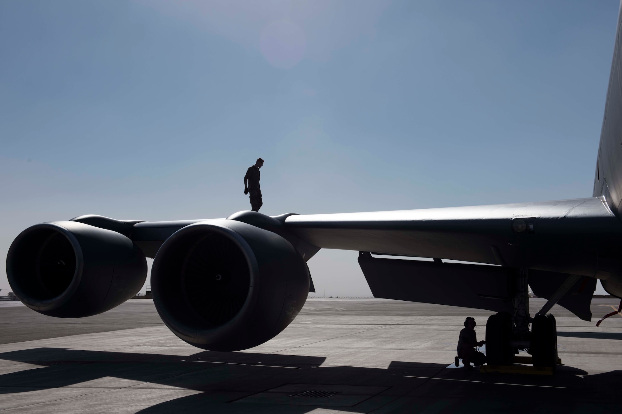 Members of the 451st Expeditionary Aircraft Maintenance Squadron inspect a KC-135 Stratotanker, assigned to the 340th Expeditionary Air Refueling Squadron, after it lands at Kandahar Airfield, Afghanistan, Nov. 18, 2018.