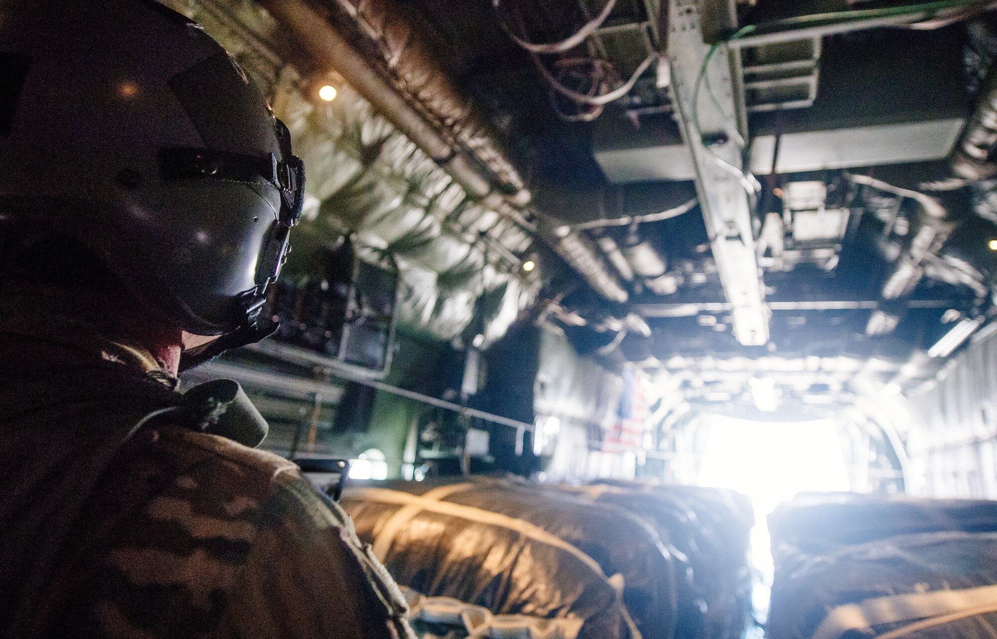 C-130 aircrew delivers combat supplies through air drop