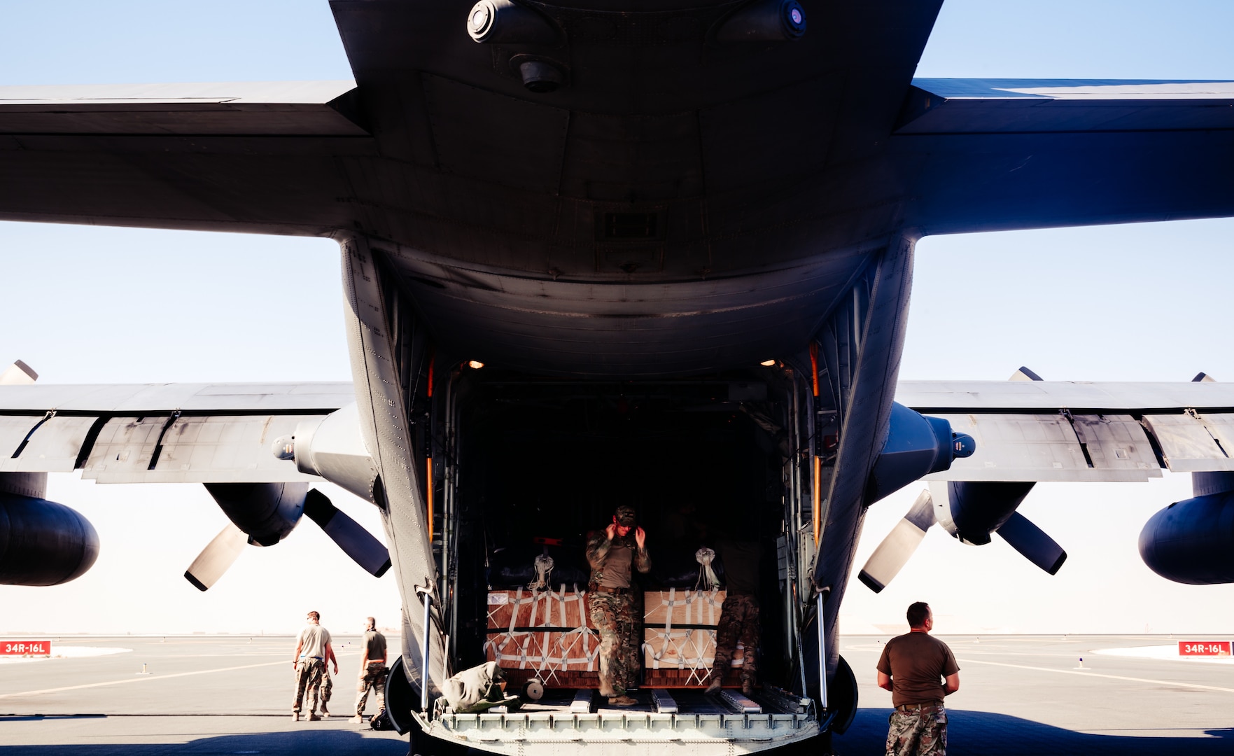 C-130 aircrew delivers combat supplies through air drop