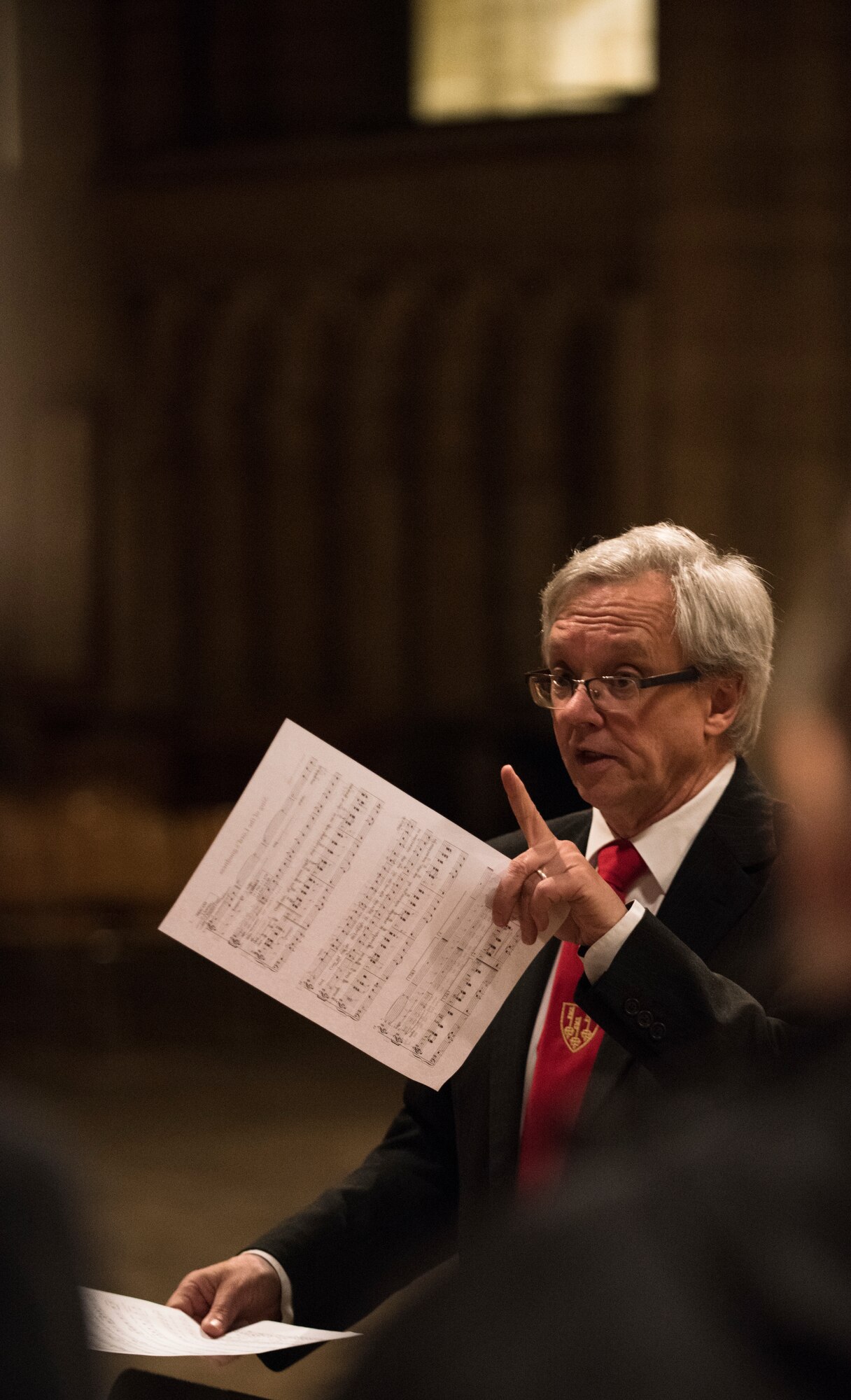 A choir director conducts the Ely Cathedral Octagon Choir during the annual Thanksgiving Eve service at Ely Cathedral, England, Nov. 21, 2018. The choir sang to U.S. Airmen from RAF Mildenhall and RAF Lakenheath, their family members, East Anglians, and others, at the Ely service that began 32 years ago. (U.S. Air Force photo by Senior Airmen Kelly O'Connor)