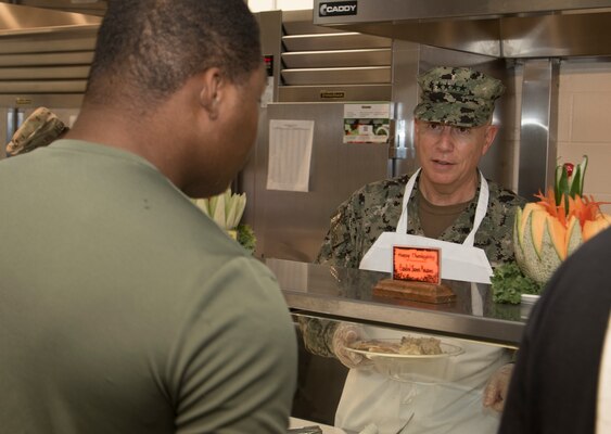 Navy Adm. Kurt W. Tidd, Commander, U.S. Southern Command, visited Joint Task Force Guantanamo Troopers to celebrate the Thanksgiving holiday as one of his final acts as commander, Nov. 22. Tidd was joined by incoming SOUTHCOM Commander, Navy Adm. Craig S. Faller; Marine Sgt. Maj. Bryan K. Zickefoose, SOUTHCOM Command Senior Enlisted Leader; and JTF GTMO leaders, to visit Troopers on duty and serve Thanksgiving lunch at the Camp America Galley.