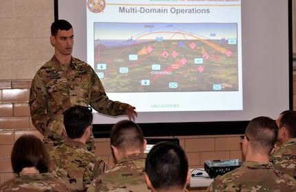 U.S. Army Maj. John Rodriguez, an experienced IO officer, touches on the unification of information-related capabilities in a multi-domain battlefield environment demonstrated in an exercise known as Cyber Blitz 2018.