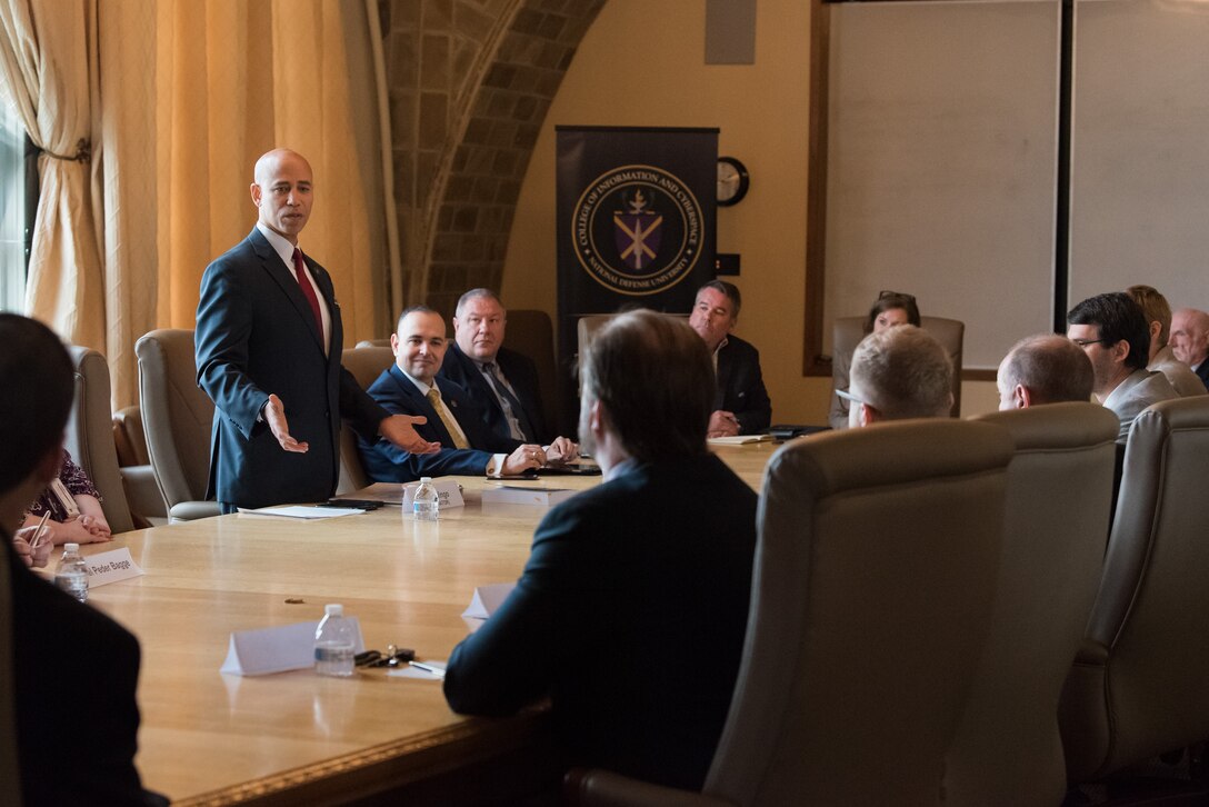 Photo of Harry Wingo moderating US-Czech Roundtable