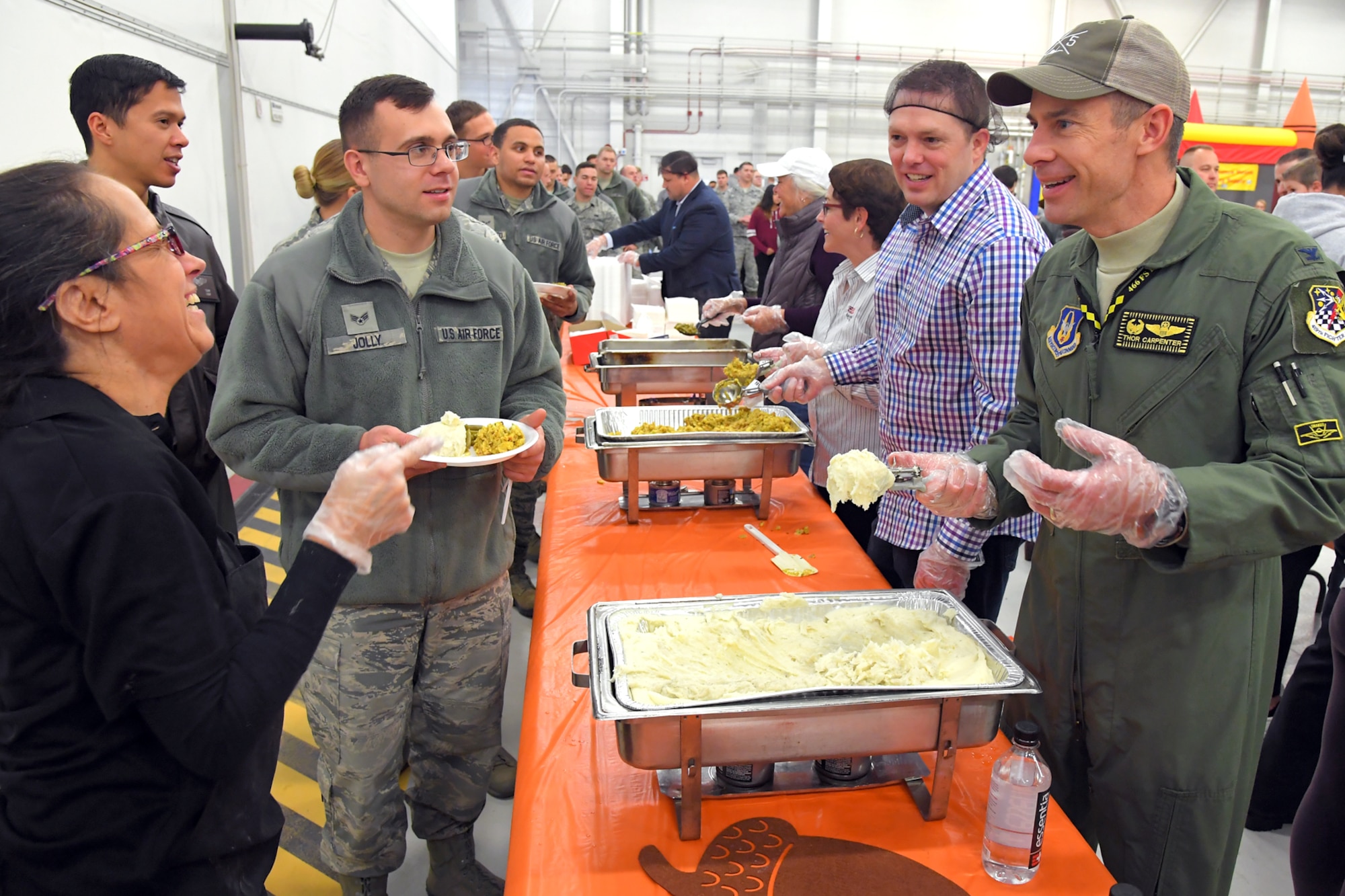 Col. Sean Carpenter, 419th Operations Group commander, serves Airmen during a Thanksgiving feast hosted by Hill Air Force Base’s fighter wings Nov. 21.