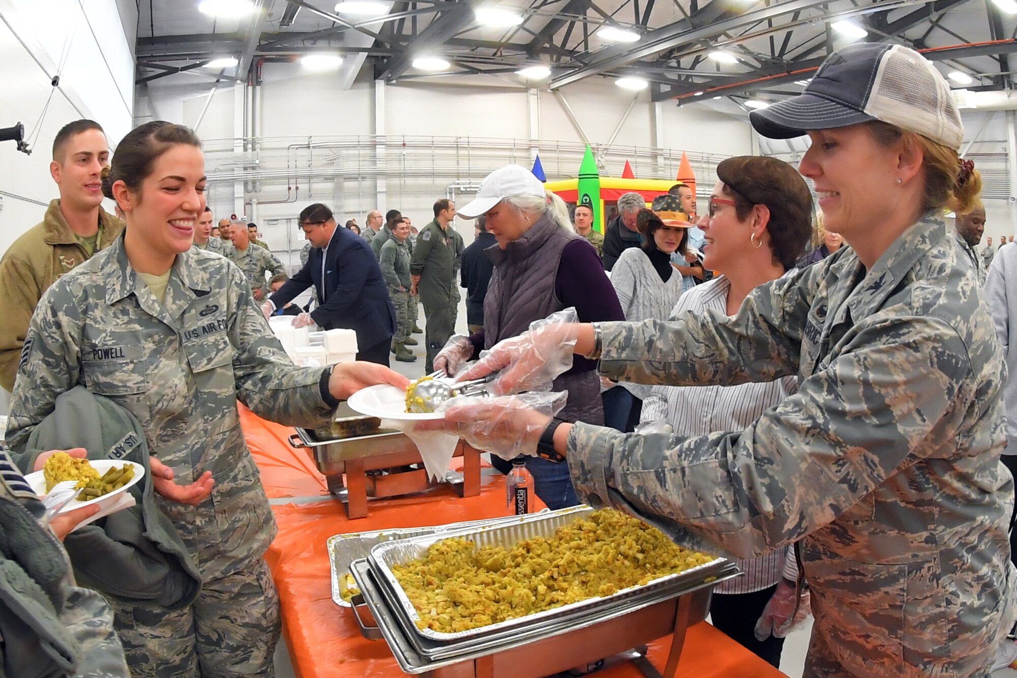 Col. Gina Sabric, 419th Fighter Wing commander, serves Airmen during a Thanksgiving feast hosted by Hill Air Force Base’s fighter wings Nov. 21.