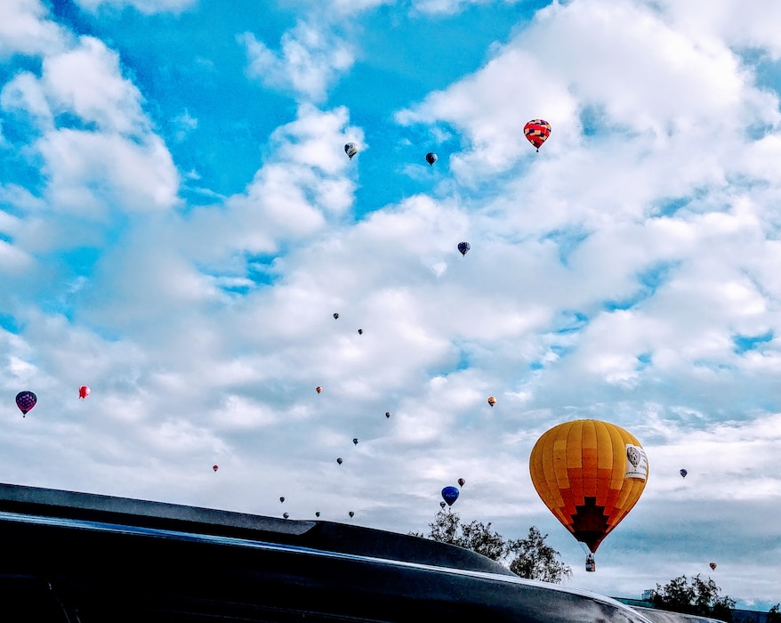 ALBUQUERQUE, N.M. – Hot air balloons dot the sky over the District office during the Albuquerque International Balloon Fiesta, Oct. 9, 2018. Photo by Jeannette Alderete. This was a 2018 photo drive entry.