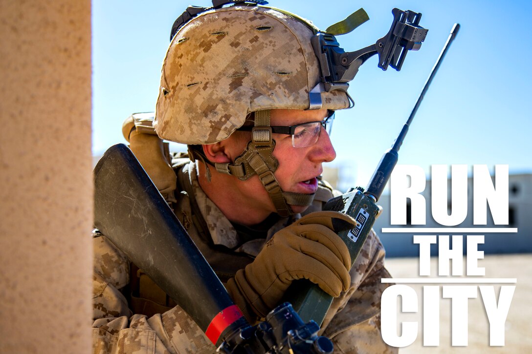 Lance Cpl. Corey Hill radios in his position during urban effects training on Camp Wilson, Marine Corps Air Ground Combat Center Twentynine Palms, California, Nov. 12, 2018. Marines with Transportation Services Company, Combat Logistics Battalion 4, Combat Logistics Regiment 3, 3rd Marine Logistics Group, maneuvered through a simulated combat town with vehicles in order to improve efficiency in combat environments. ITX 1-19 is a large-scale Marine Air-Ground Task Force integration exercise in which CLB-4 Marines and Sailors train to respond quickly to any contingency by fully integrating with ground and air combat elements of the MAGTF. Hill is a native of Shreveport, Louisiana.  (U.S. Marine Corps photo by Cpl. Joshua Pinkney)