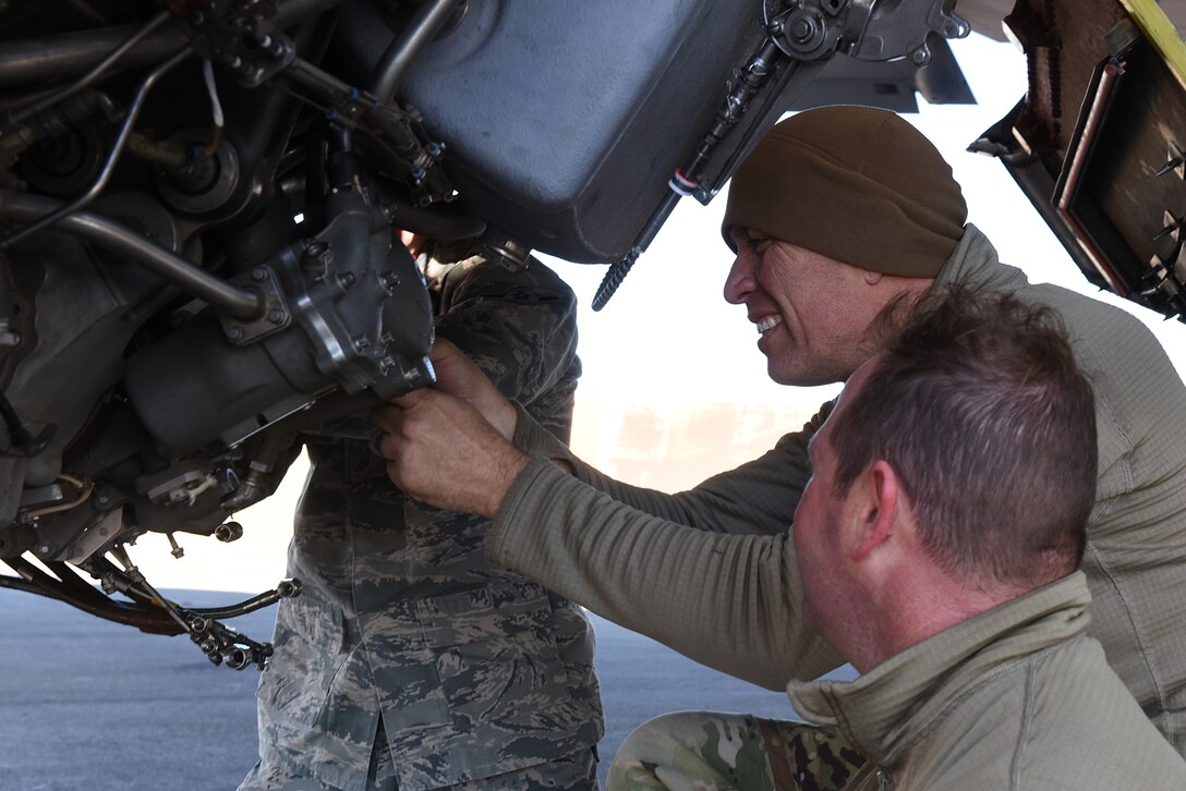 U.S. Air Force members take apart an engine on a KC-135 Stratotanker at Incirlik Air Base, Turkey, Nov. 15, 2018.