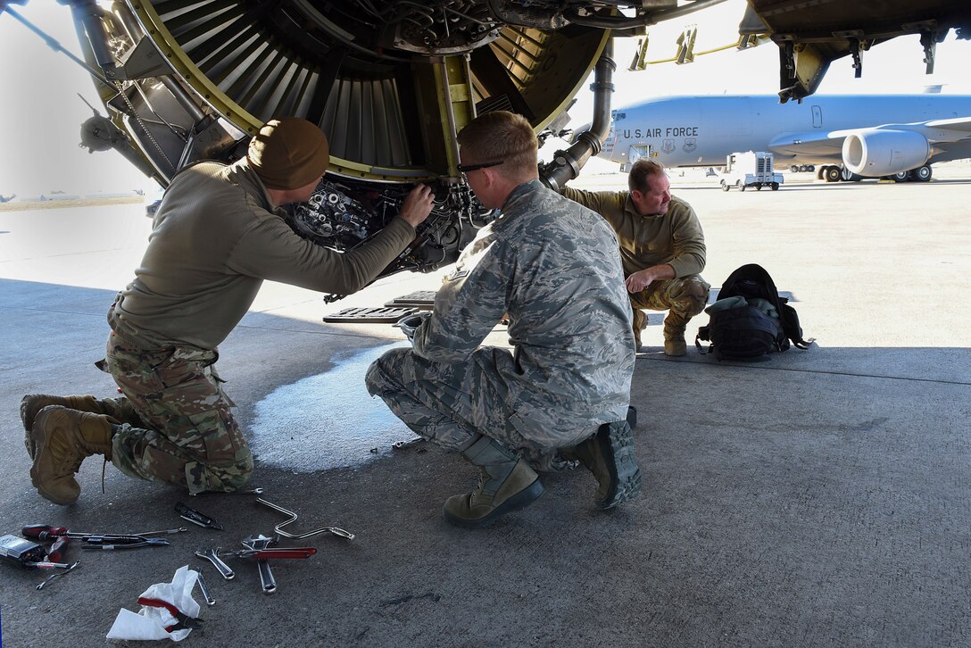 U.S. Air Force members take apart an engine on a KC-135 Stratotanker at Incirlik Air Base, Turkey, Nov. 15, 2018.