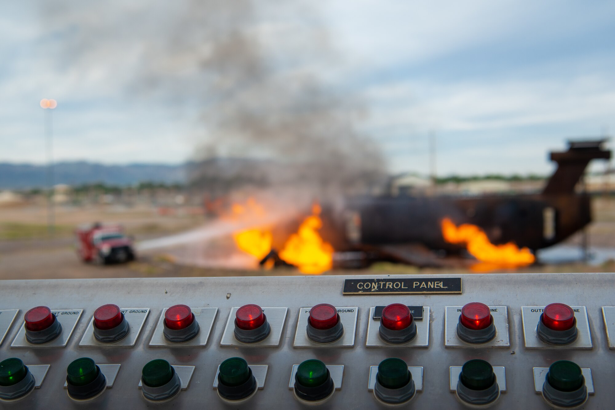 Firefighters assigned to the 56th Civil Engineer Squadron try to extinguish a training fuselage fire during a joint aircraft and structural live fire training, Nov. 14, 2018 at Luke Air Force Base, Ariz.