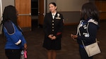 Chief Petty Officer Isabel Guerrero, Division 6 leading chief petty officer, Navy Recruiting District San Antonio, speaks with (left) Erica Jew of St. Louis and (right) future Sailor Ashiyanna Landers of Newport News, Va., during an All-Female Delayed Entry Program and Key Influencer Meeting hosted by NRD San Antonio at the Rosenberg Sky Room on the campus of the University of the Incarnate Word.  Landers, who attended San Antonio College, joined the Navy to become a hospital corpsman. Jew attended the event to provide Landers with moral and emotional support.