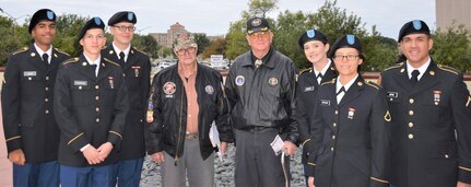 John Smelik (center, left), a retired U.S. Marine, and son-in-law Travis Briggs (center, right), retired Air Force, have hosted Soldiers for Mission Thanksgiving for the last 17 years.