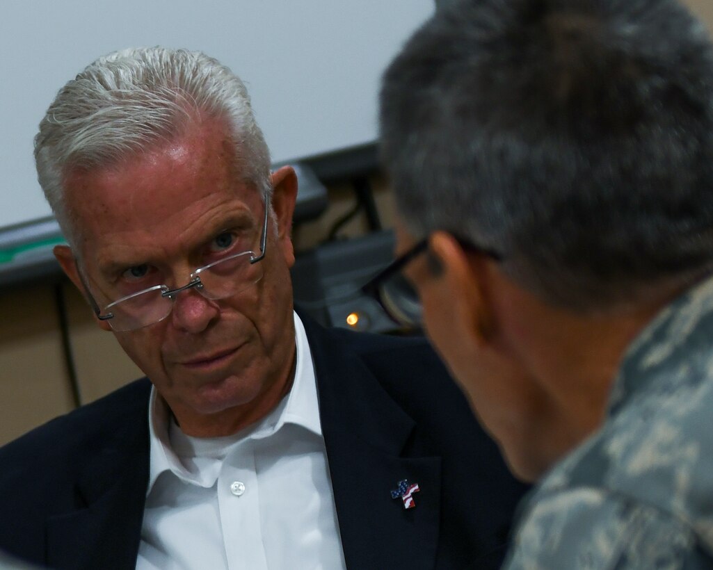 U.S. Congressman Bill Johnson, representing Ohio's 6th Congressional District, talks with 910th Airlift Wing leaders, including 910th Airlift Wing Commander Col. Dan Sarachene and 910th Airlift Wing Vice Commander Col. Joe Janik here, Nov. 19, 2018.