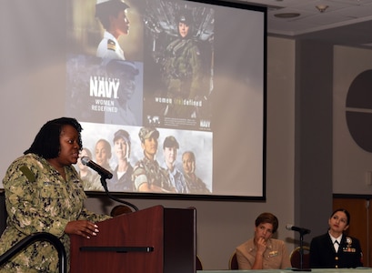 Senior Chief Petty Officer Julie Pierre-Louis, assigned to Navy Information Operations Command Texas, speaks to more than 80 future Sailors, parents and supporters during an All-Female Delayed Entry Program and Key Influencer Meeting hosted by Navy Recruiting District San Antonio at the Rosenberg Sky Room on the campus of the University of the Incarnate Word.