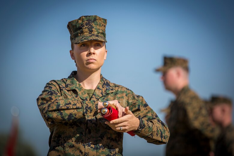 U.S. Marine Corps Capt. Robin Bosman, station adjutant, Marine Corps Air Station Yuma, participates in the 243rd Marine Corps birthday uniform pageant at the Parade Deck on Marine Corps Air Station Yuma, Ariz., Nov. 8, 2018. The annual ceremony was held in honor of the 243rd Marine Corps birthday, showcasing historical uniforms to honor Marines of the past, present and future while signifying the passing of traditions from one generation to the next. (U.S. Marine Corps photo by Sgt. Allison Lotz)