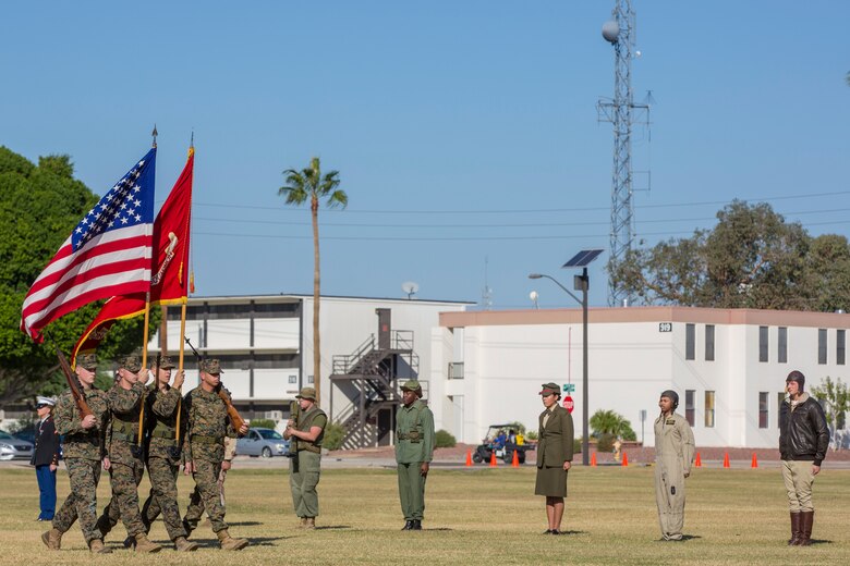 U.S. Marines with Headquarters and Headquarters Squadron, Marine Corps Air Station Yuma, participate in the 243rd Marine Corps birthday uniform pageant at the Parade Deck on Marine Corps Air Station Yuma, Ariz., Nov. 8, 2018. The annual ceremony was held in honor of the 243rd Marine Corps birthday, showcasing historical uniforms to honor Marines of the past, present and future while signifying the passing of traditions from one generation to the next. (U.S. Marine Corps photo by Sgt. Allison Lotz)