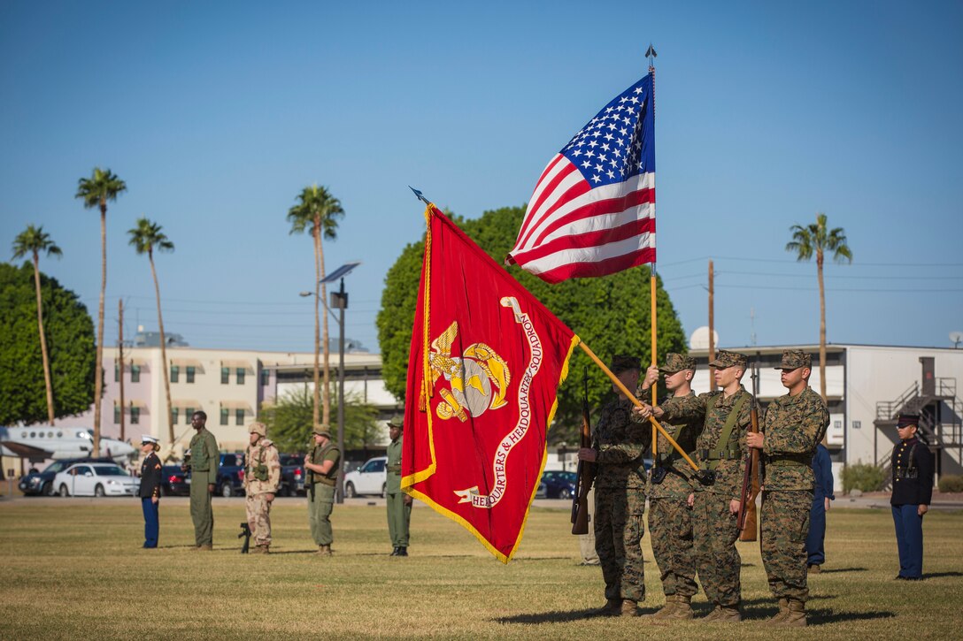 U.S. Marines with Headquarters and Headquarters Squadron, Marine Corps Air Station Yuma, participate in the 243rd Marine Corps birthday uniform pageant at the Parade Deck on Marine Corps Air Station Yuma, Ariz., Nov. 8, 2018. The annual ceremony was held in honor of the 243rd Marine Corps birthday, showcasing historical uniforms to honor Marines of the past, present and future while signifying the passing of traditions from one generation to the next. (U.S. Marine Corps photo by Sgt. Allison Lotz)