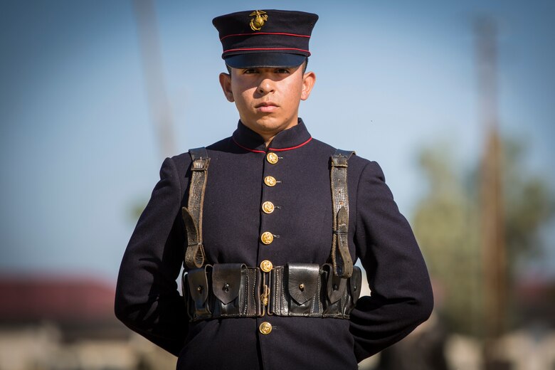A U.S. Marine with Headquarters and Headquarters Squadron, Marine Corps Air Station Yuma, participates in the 243rd Marine Corps birthday uniform pageant at the Parade Deck on Marine Corps Air Station Yuma, Ariz., Nov. 8, 2018. The annual ceremony was held in honor of the 243rd Marine Corps birthday, showcasing historical uniforms to honor Marines of the past, present and future while signifying the passing of traditions from one generation to the next. (U.S. Marine Corps photo by Sgt. Allison Lotz)