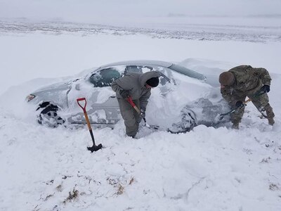 Kansas Army National Guard Soldiers from Battery A, 2nd Battalion, 130th Field Artillery and Headquarters and Headquarters Battery, 2nd Battalion, 130th Field Artillery, helped out stranded motorists in Marshall County along Highway 36 on Nov. 25, 2018.  The Kansas Army National Guard had nine Stranded Motorists Assistance Response Teams stationed across Kansas to assist local law enforcement during a snow storm that struck earlier that day.