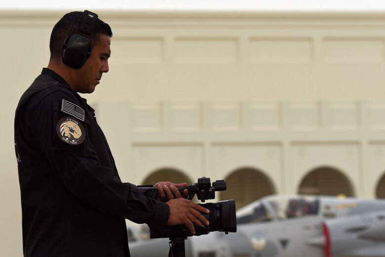 U.S. Air Force Tech. Sgt. Luis Lopez, F-16 Viper Demonstration Team (VDT) dedicated crew chief, records his team members as they prepare for a demonstration on the flight line at Sakhir Airbase, Kingdom of Bahrain, Nov. 16, 2018.