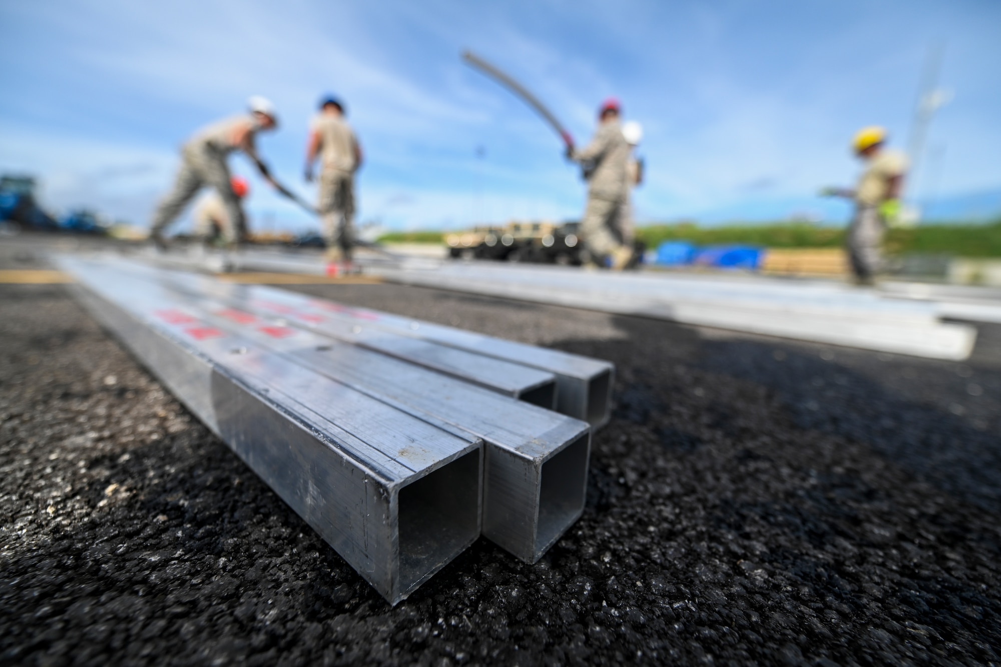 Members of the 254th Rapid Engineer Deployable Heavy Operational Repair Squadron Engineers and the 36th Civil Engineer Squadron build the frame of an  Alaskan Small Shelter System in the village of Koblerville, Saipan, Commonwealth of the Northern Mariana Islands, Nov. 23, 2018.