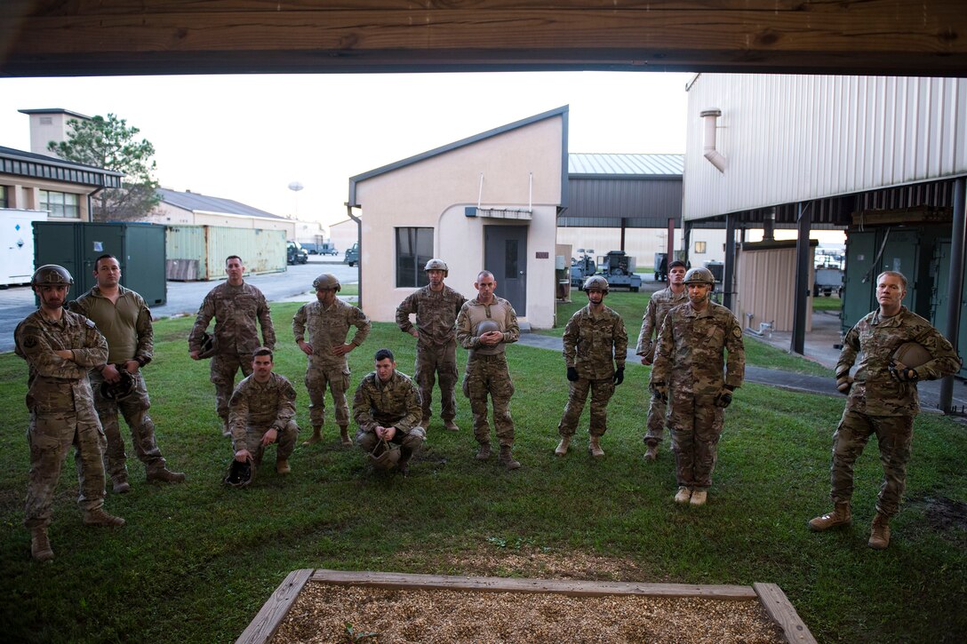 Airmen from the 93d Air Ground Operations Wing receive instruction during static-line jump training, Nov. 21, 2018, at Moody Air Force Base, Ga. The overall objective of the training was to increase jumpers’ skills, knowledge and proficiency in regards to airborne operations. During a static-line jump, the jumper is attached to the aircraft via the ‘static-line’, which automatically deploys the jumpers’ parachute after they’ve exited the aircraft. (U.S. Air Force photo by Airman 1st Class Erick Requadt)