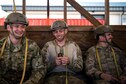 Airmen from the 93d Air Ground Operations Wing share a laugh during static-line jump training, Nov. 21, 2018, at Moody Air Force Base, Ga. The overall objective of the training was to increase jumpers’ skills, knowledge and proficiency in regards to airborne operations. During a static-line jump, the jumper is attached to the aircraft via the ‘static-line’, which automatically deploys the jumpers’ parachute after they’ve exited the aircraft. (U.S. Air Force photo by Airman 1st Class Erick Requadt)