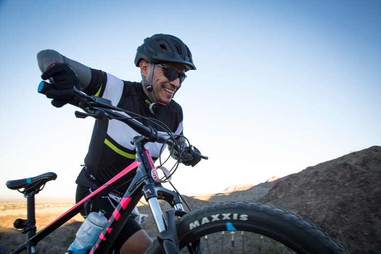 U.S. Marines, Sailors, and civilians participate in the first annual Telegraph Pass Challenge in Yuma, Ariz., Nov. 3, 2018. The challenge, coordinated by Marine Corps Community Services (MCCS), offered participants the opportunity to compete for first, second, or third place in either a 5 mile run, 5 mile bike route, or both. The course included a "Blue Mile" which is typically the most difficult portion of the racing event being a silent mile. The "Blue Mile" honors and remembers all fallen heroes of the Military, Police, and Fire Department. (U.S. Marine Corps photo by Sgt. Allison Lotz)