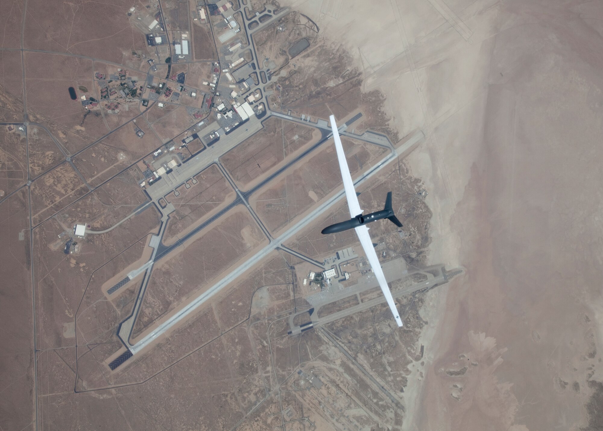 A European version of the Global Hawk flies over Edwards Air Force Base. (U.S. Air Force photo by Bobbi Zapka)