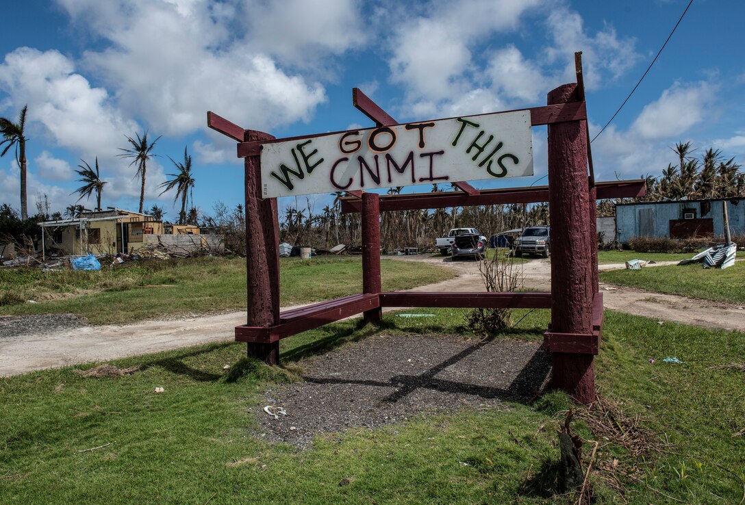 The Camacho family painted this sign in Saipan, Commonwealth of the Northern Mariana Islands Oct. 28, 2018, just three days after Super Typhoon Yutu.