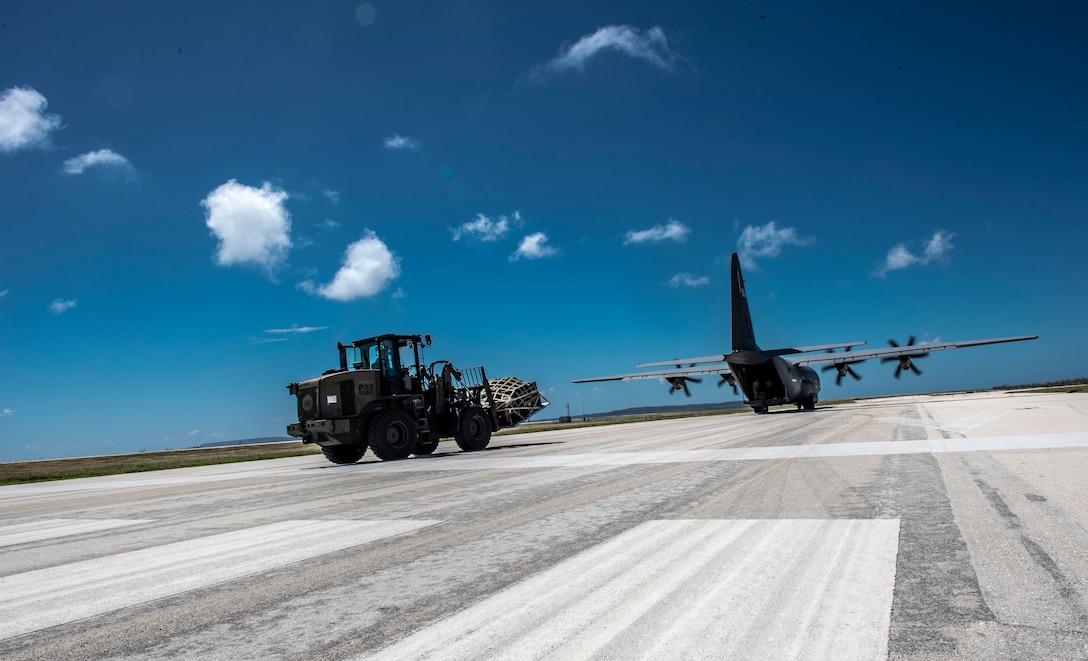 36th Contingency Response Group members from Andersen Air Force Base, Guam offload relief supplies from a U.S. Air Force C-130J Super Hercules assigned to the 374th Airlift Wing at Yokota Air Base, Japan in Saipan, Commonwealth of the Northern Mariana Islands (CNMI) Nov. 5, 2018.