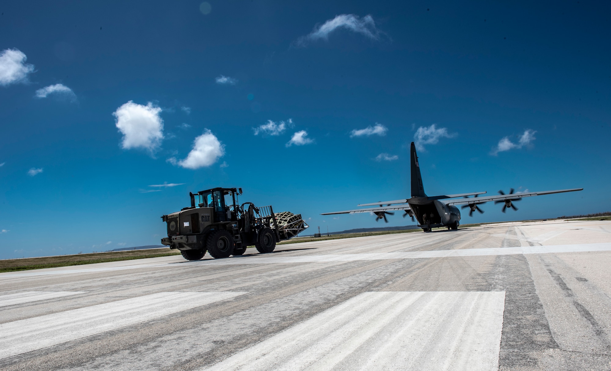 36th Contingency Response Group members from Andersen Air Force Base, Guam offload relief supplies from a U.S. Air Force C-130J Super Hercules assigned to the 374th Airlift Wing at Yokota Air Base, Japan in Saipan, Commonwealth of the Northern Mariana Islands (CNMI) Nov. 5, 2018.