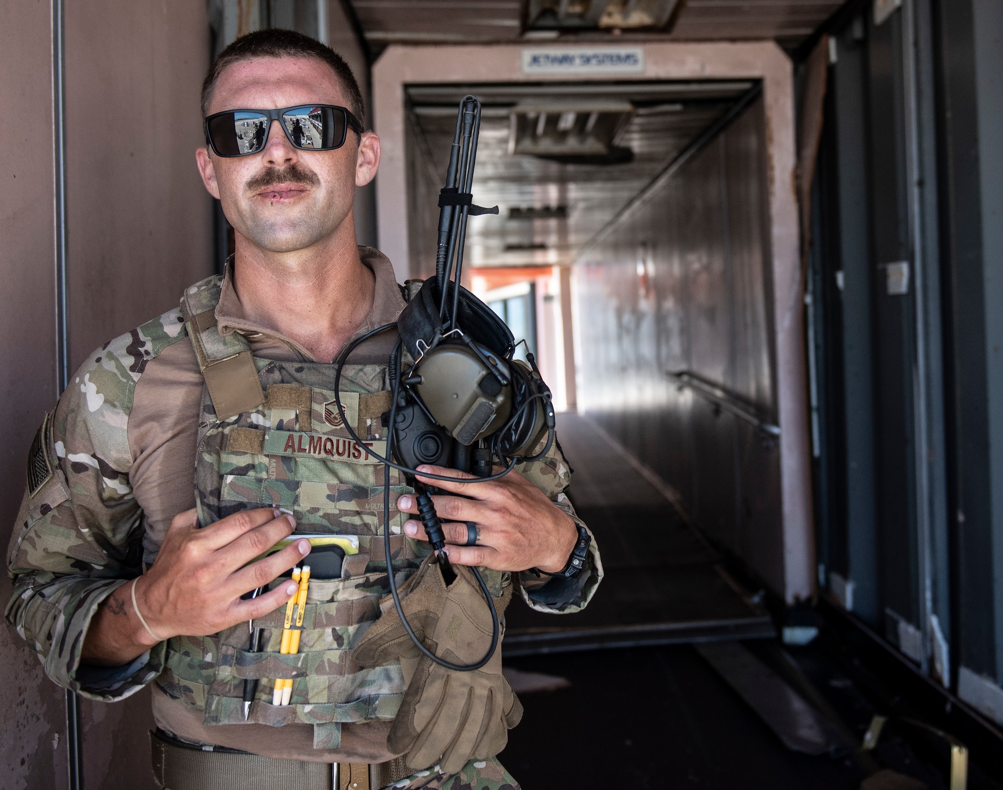 U.S. Air Force Master Sgt. Jaime Almquist, 36th Mobility Response Squadron contingency response team chief, at Andersen Air Force Base, Guam observes relief operations at the airport in Saipan, Commonwealth of the Northern Mariana Islands (CNMI) Nov. 5, 2018.