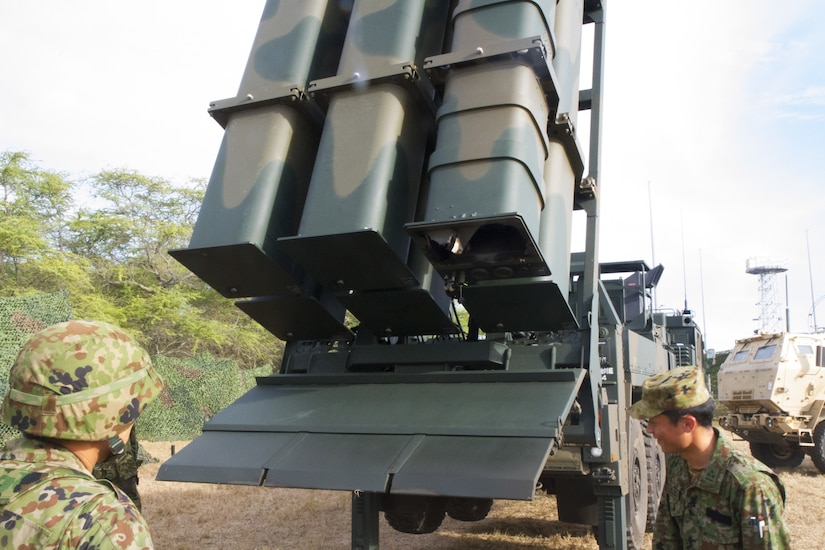 Members of the Western Artillery Japan Ground Self-Defense Force (JGSDF) examine their equipment after the launch of a surface-to-ship missile at Pacific Missile Range Facility Barking Sands, July 12. The JGSDF alongside the 17th Field Artillery Brigade, headquarters of the U.S. Army's Multi Domain Task Force Pilot Program, conducted a joint live-fire exercise in support of the Rim of the Pacific (RIMPAC) exercise. Twenty-five nations, 46 ships, and five submarines, and about 200 aircraft and 25,000 personnel are participating in RIMPAC from June 27 to Aug. 2 in and around the Hawaiian Island and Southern California. The world's largest international maritime exercise, RIMPAC provides a unique training opportunity while fostering and sustaining cooperative relationships among the participants critical to ensuring the safety of sea lanes and security on the world's oceans. RIMPAC 2018 is the 26th exercise in the series that began in 1971. (U.S. Army photo by Capt. Rachael Jeffcoat/Released)