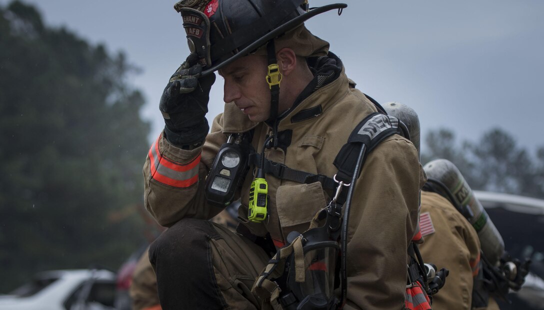 Whit Dodson, 20th Civil Engineer Squadron driver operator, takes a moment to readjust at Shaw Air Force Base, S.C., Nov. 20, 2018.