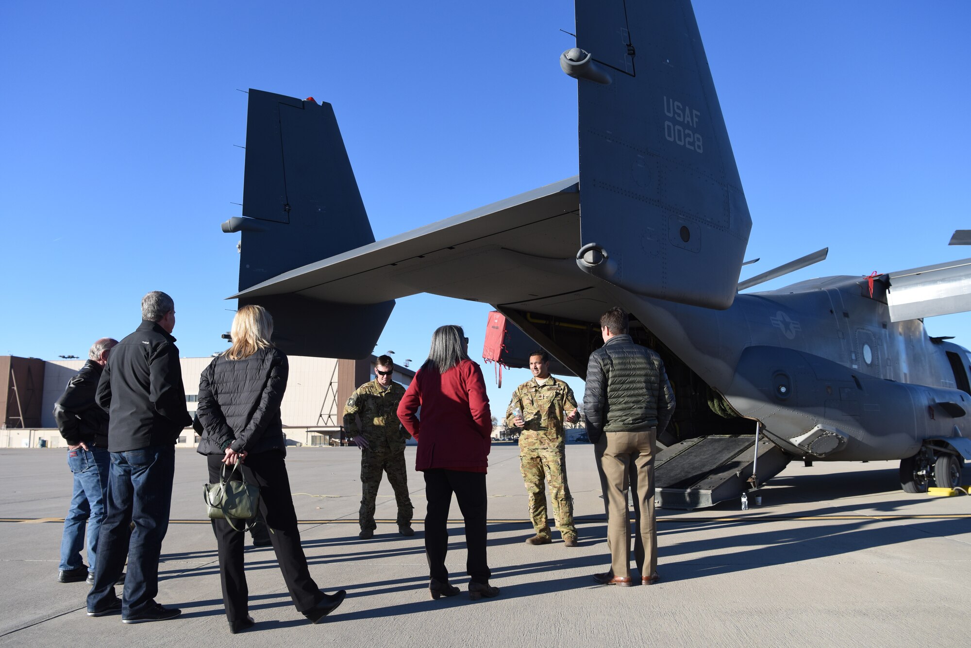 U.S. Air Force Major Arjun Rau, 58th Training Squadron CV-22 Osprey evaluator pilot, discusses the capabilities of the CV-22 to members of the Kirtland Partnership Committee at Kirtland Air Force Base, N.M., Nov. 26, 2018. The KPC is a local civic group that advocates for Team Kirtland and its part of the National Security Complex. (U.S. Air Force photo by Senior Airman Eli Chevalier)