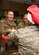 U.S. Air Force Col. Erin Cluff, 633rd Mission Support Group commander, serves a U.S. Army Soldier a Thanksgiving meal at Joint Base Langley-Eustis, Virginia, Nov. 22, 2018.