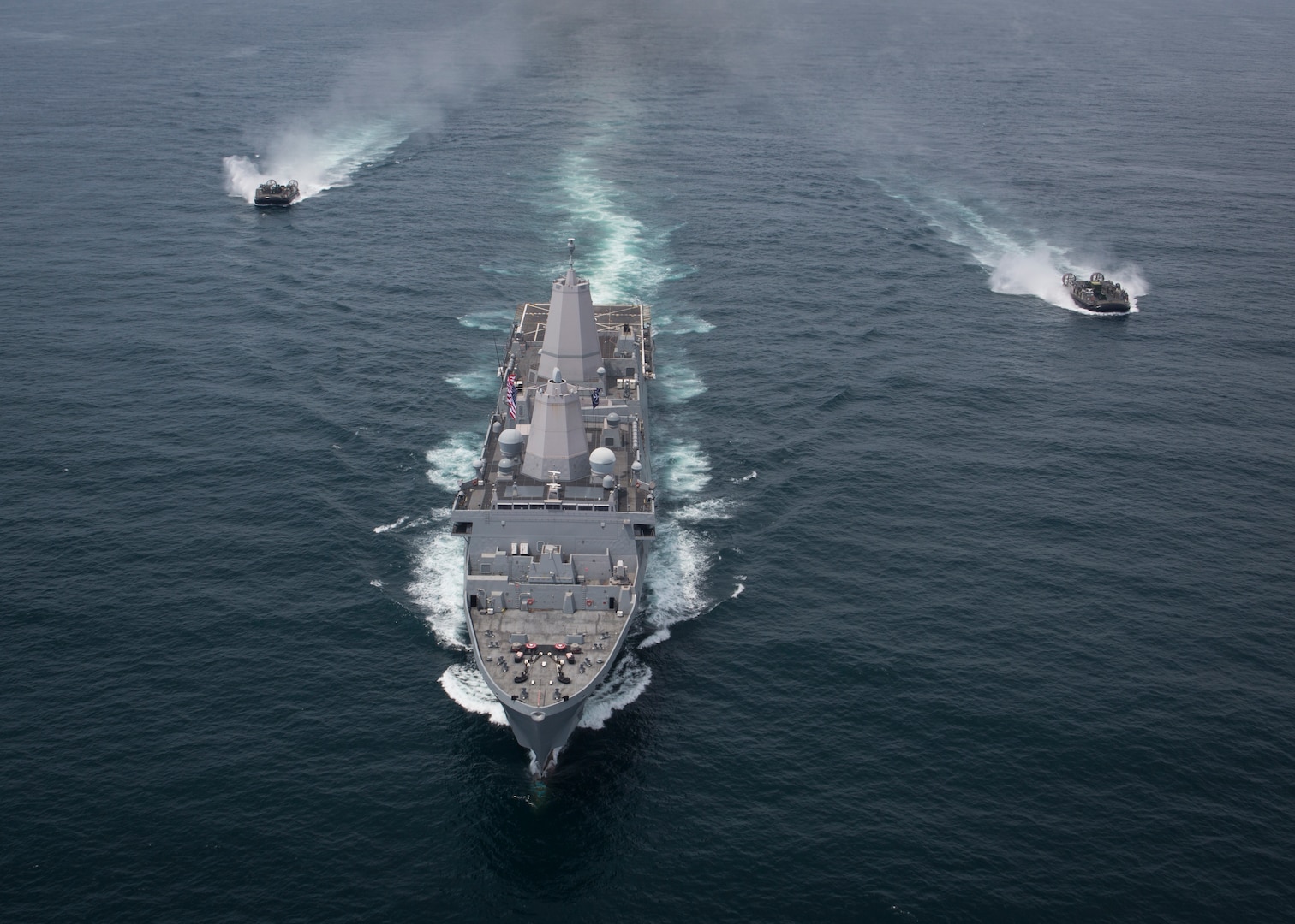 The U.S. Navy San Antonio-class amphibious transport dock ship USS Somerset (LPD 25)  and two Landing Craft, Air Cushioned hovercraft transport U.S. Marines and sailors with Special Purpose Marine Air-Ground Task Force - Peru during a humanitarian assistance and disaster relief exercise off of the coast of Chorrillos Beach near Lima, Peru, Nov. 24, 2018.