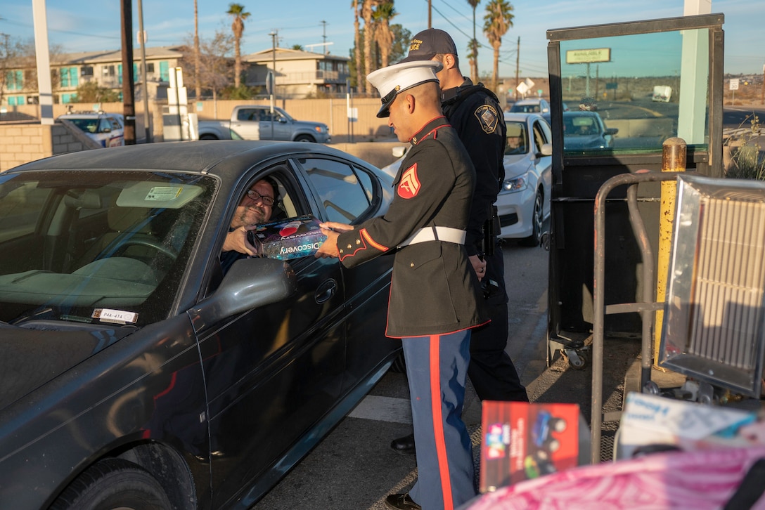 Marine Corps Logistics Base Barstow received toy donations from troops, their spouses, and civilian employees during Toys for Tots Tuesday, that will be given out to children in the local community during the holiday season and were received at the front gate of MCLB Barstow, California, Nov. 27. Toys can be donated every Tuesday at the front entrances of both annexes.
(U.S. Marine Corps Photo by Jack J. Adamyk)