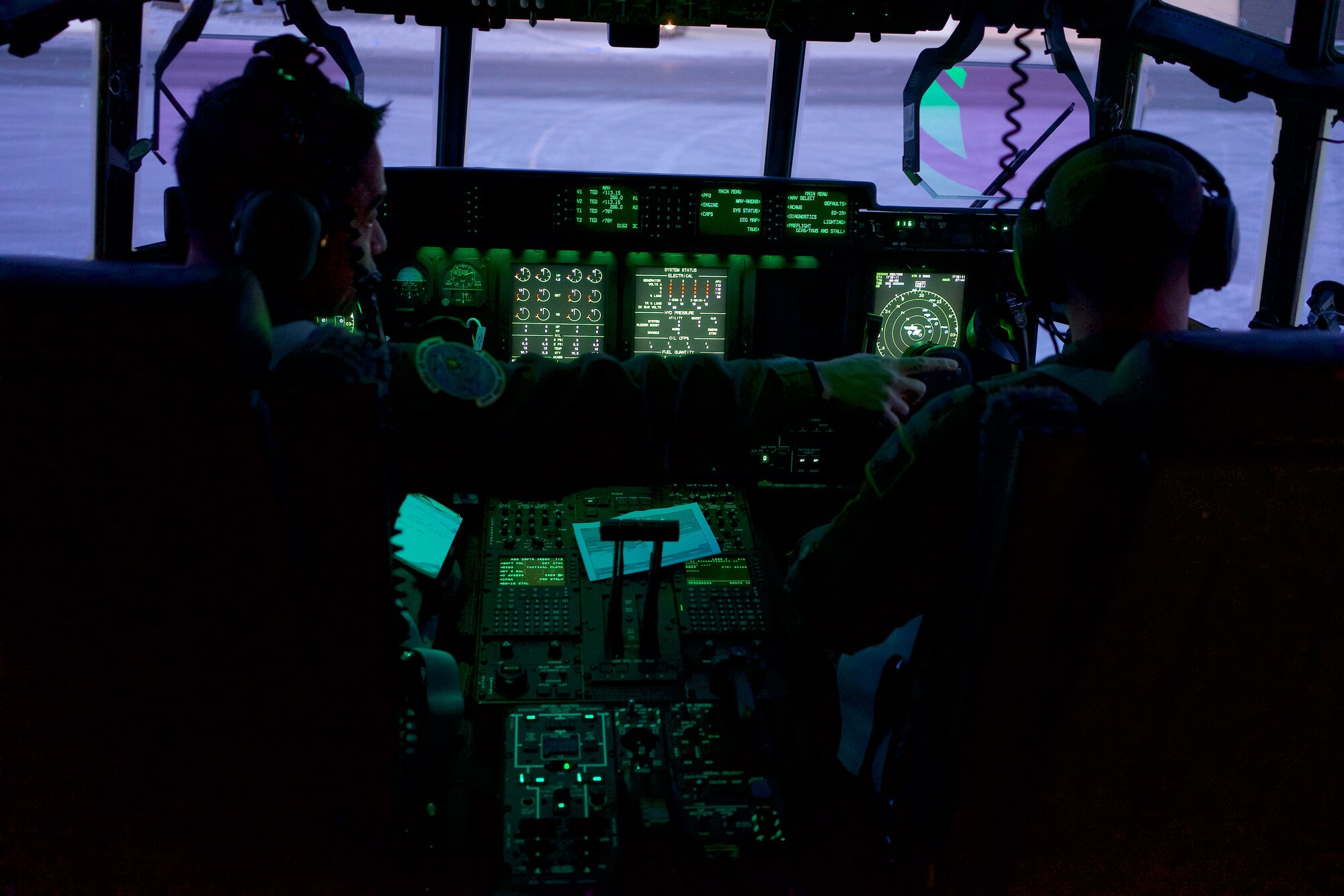 Alaska Air National Guard Lt. Col. Eric Budd, 211th Rescue Squadron commander, and Capt. Christopher Brunner, 211th RQS HC-130J Combat King II pilot, conduct pre-flight procedures Nov. 6, 2018, at Joint Base Elmendorf-Richardson, Alaska, before transporting prescription drugs to Spokane, Washington, for incineration. Airmen of 176th Wing, members of the Alaska National Guard Counterdrug Support Program, and special agents of the Drug Enforcement Administration joined forces in the effort of transporting more than 4,000 pounds of prescription drugs turned in during Alaska’s biannual prescription drug take back. (U.S. Air National Guard photo by David Bedard/Released)